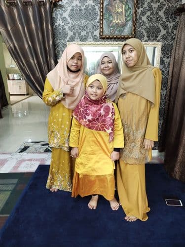 Siti B., wearing Chanella™